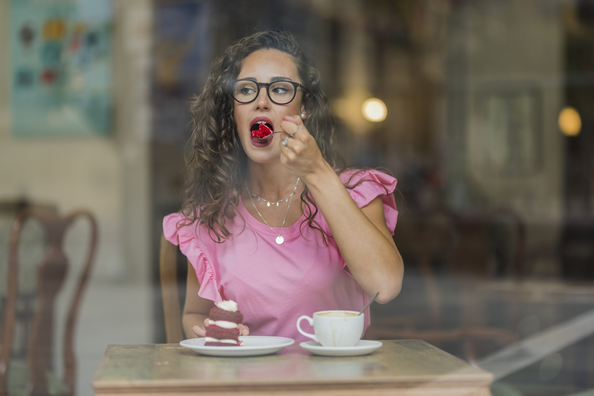 woman eating dessert